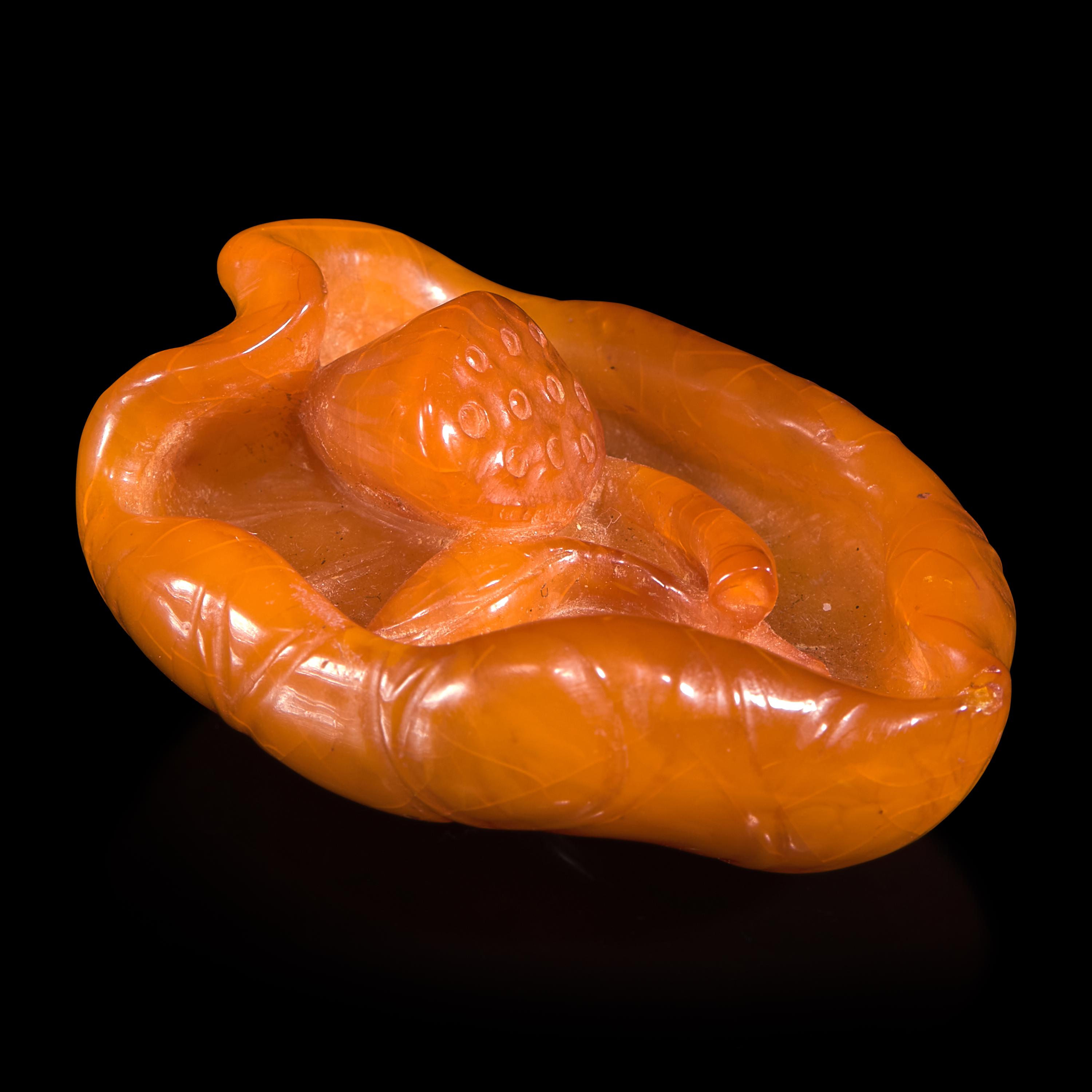 A Chinese 'Beeswax' Amber Lotus Pod and Leaf Pendant — 蜜蠟雕荷葉蓮蓬墜