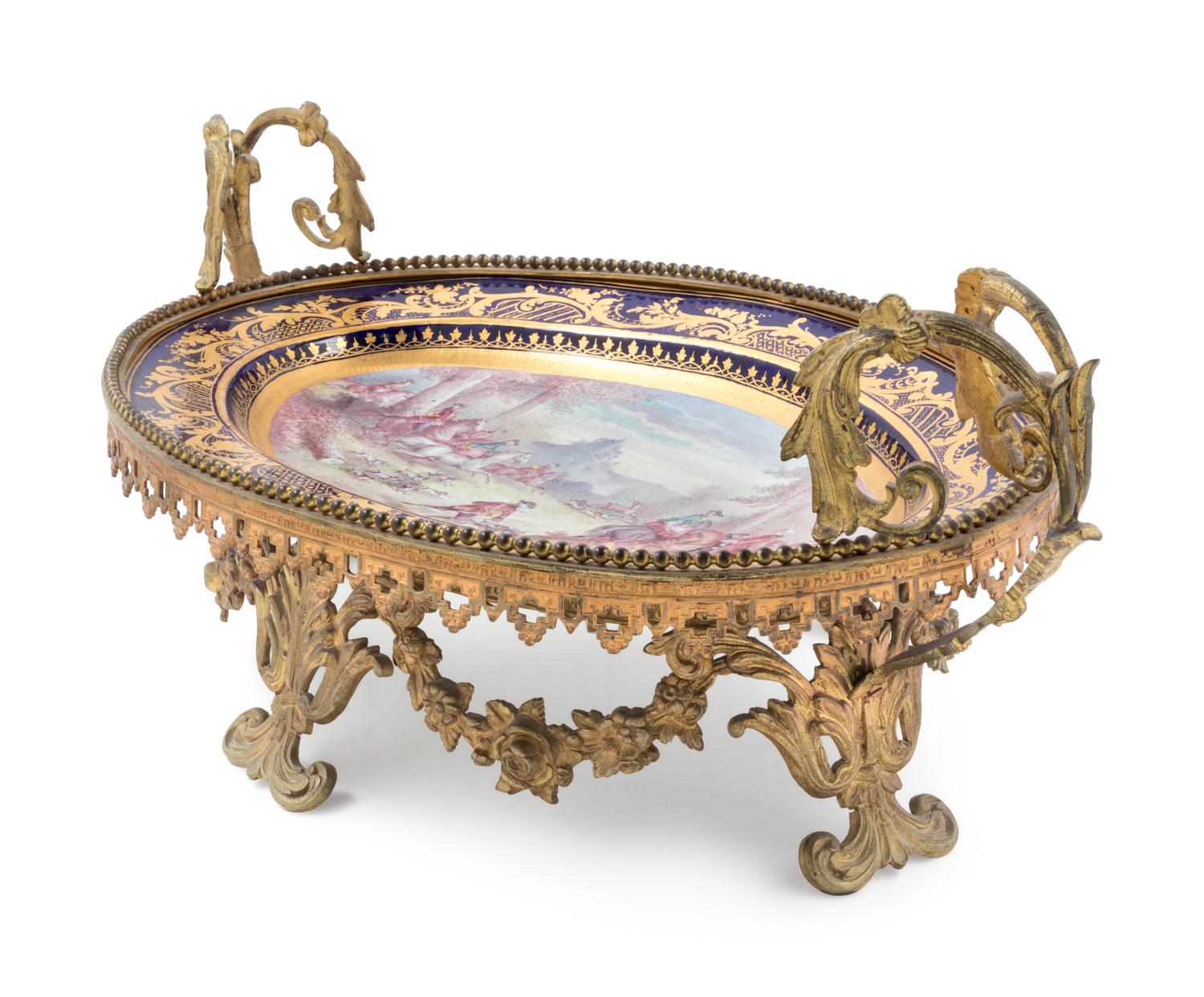 A Sèvres Style Gilt Metal Mounted Painted and Parcel Gilt Porcelain Center Bowl