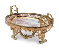 A Sèvres Style Gilt Metal Mounted Painted and Parcel Gilt Porcelain Center Bowl