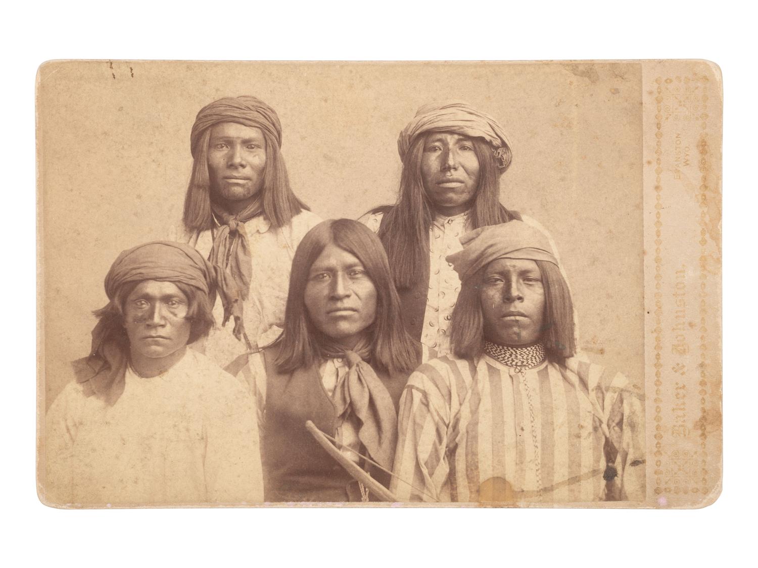 [NATIVE AMERICANS]. BAKER & JOHNSTON, photographers. Cabinet card of Apache prisoners.