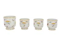 A Set of Four Limoges Porcelain Cache Pots