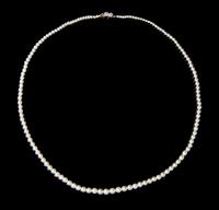 A Graduated Single Strand Natural Pearl Necklace,