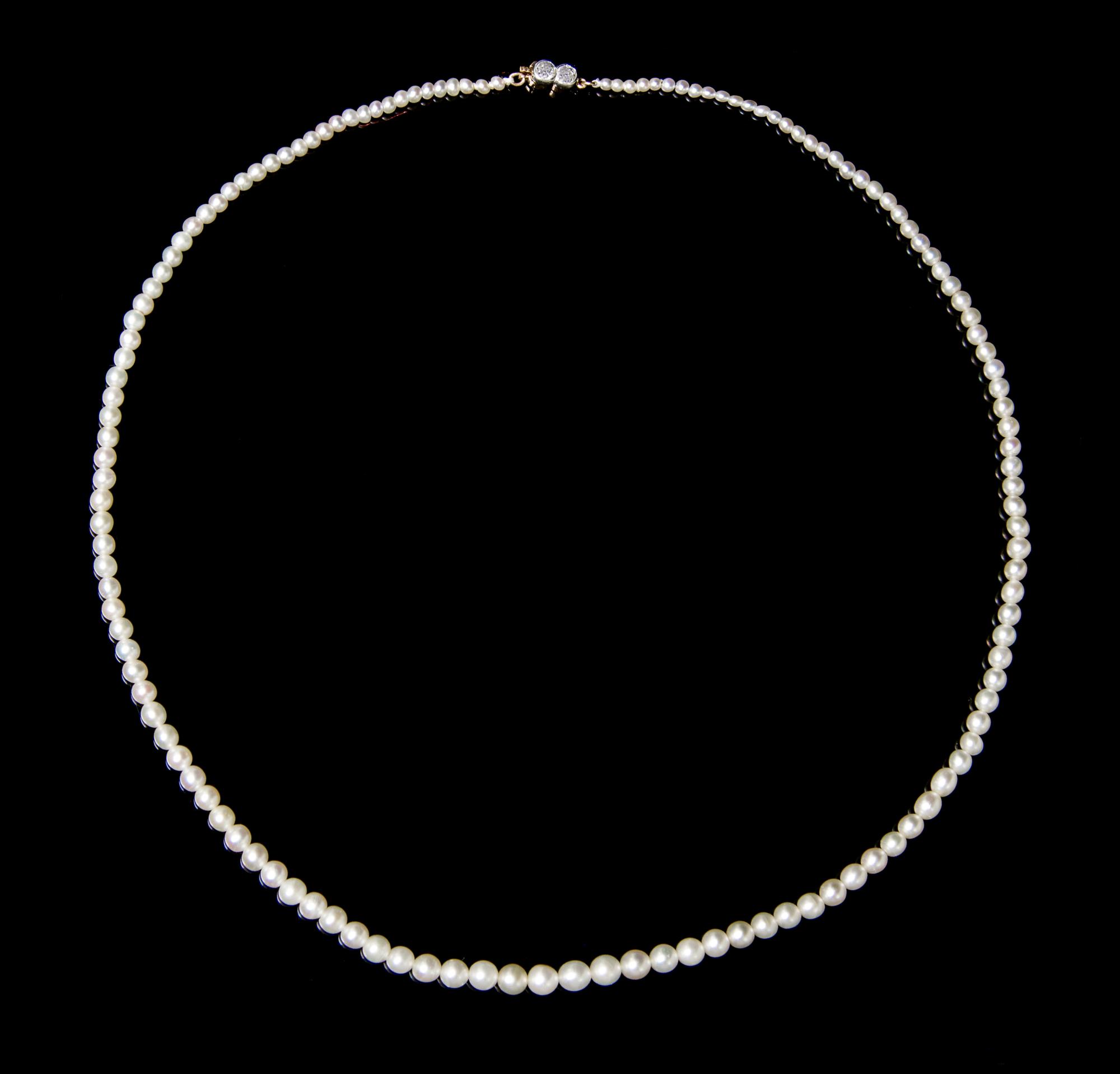 A Graduated Single Strand Natural Pearl Necklace,