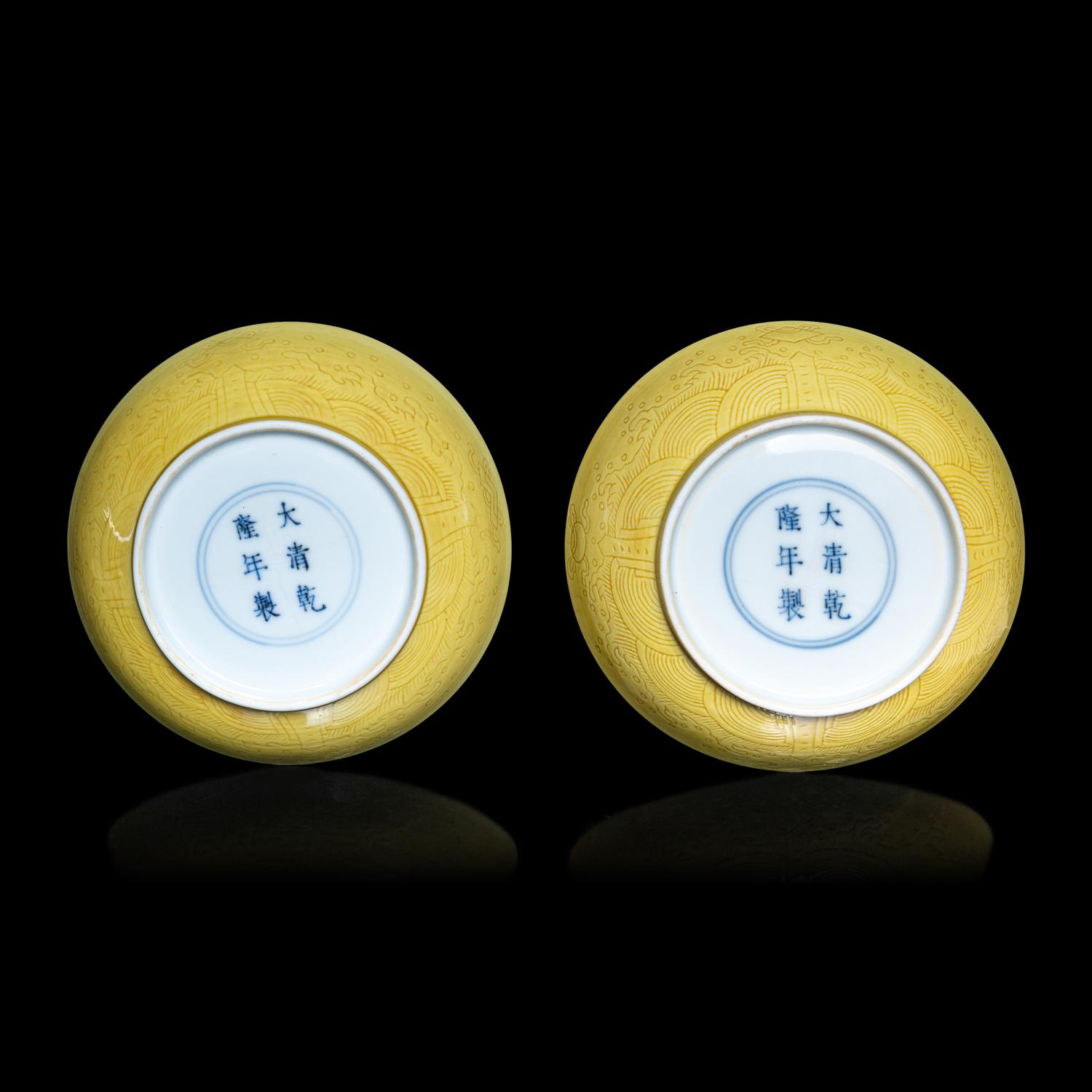 A Pair of Chinese Yellow Glazed Incised Porcelain 'Dragon' Dishes, Qianlong Marks and of the Period 清乾隆 嬌黃釉龍紋碟一對