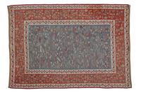 A Flat Woven Wool Rug 10 feet 7 inches x 7 feet 6 inches.