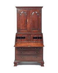 A Chippendale Carved Cherrywood Desk and Bookcase