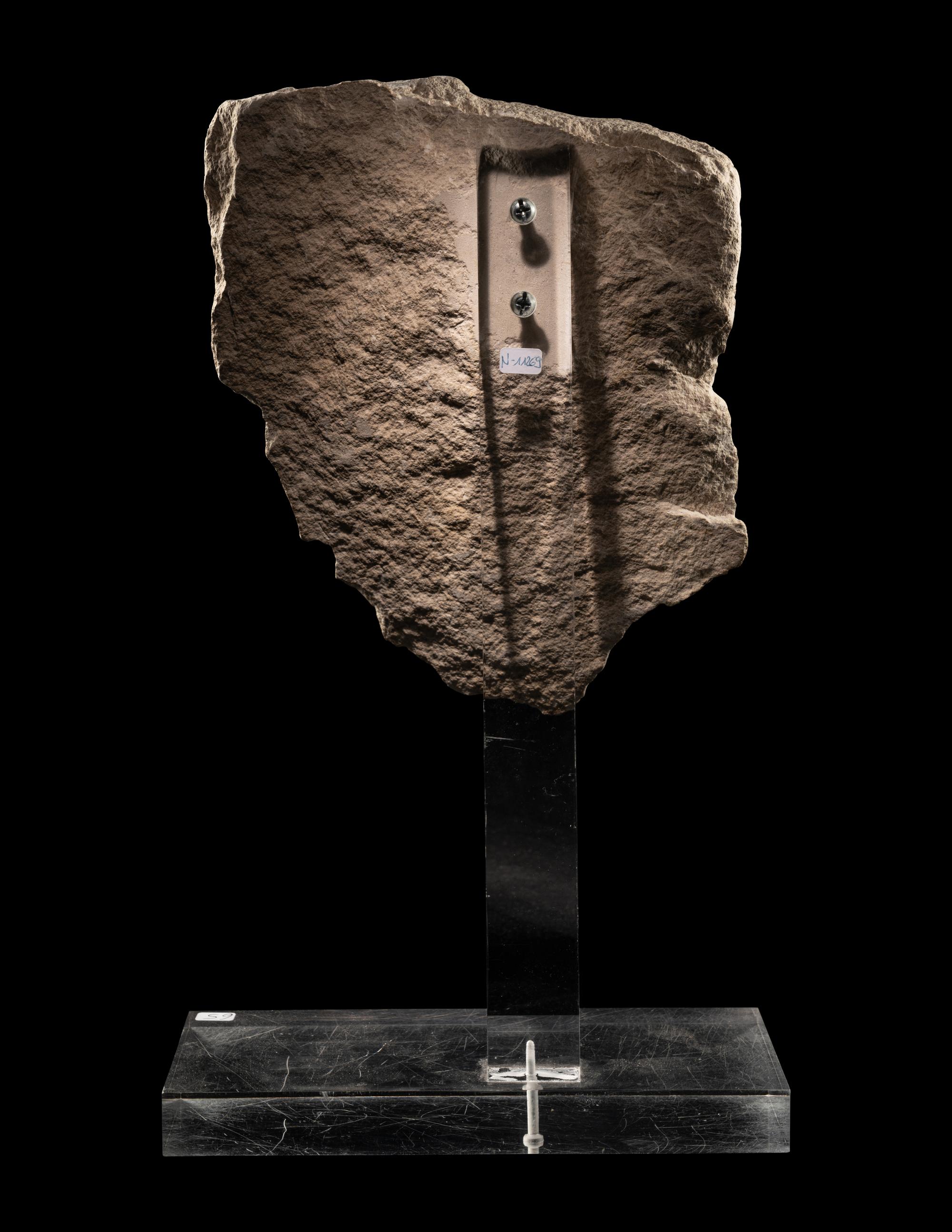 An Egyptian Limestone Relief Fragment