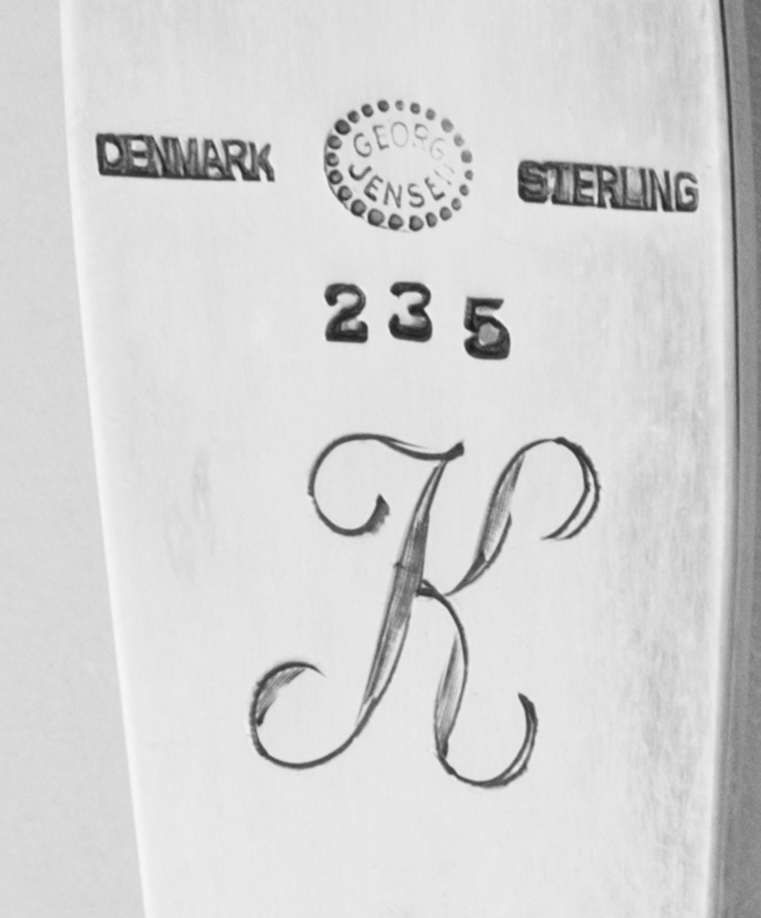 A Danish Silver Tea Strainer on Stand, Georg Jensen Silversmithy, Copenhagen, 1945-77, Blossom pattern, each with monogrammed initial K
