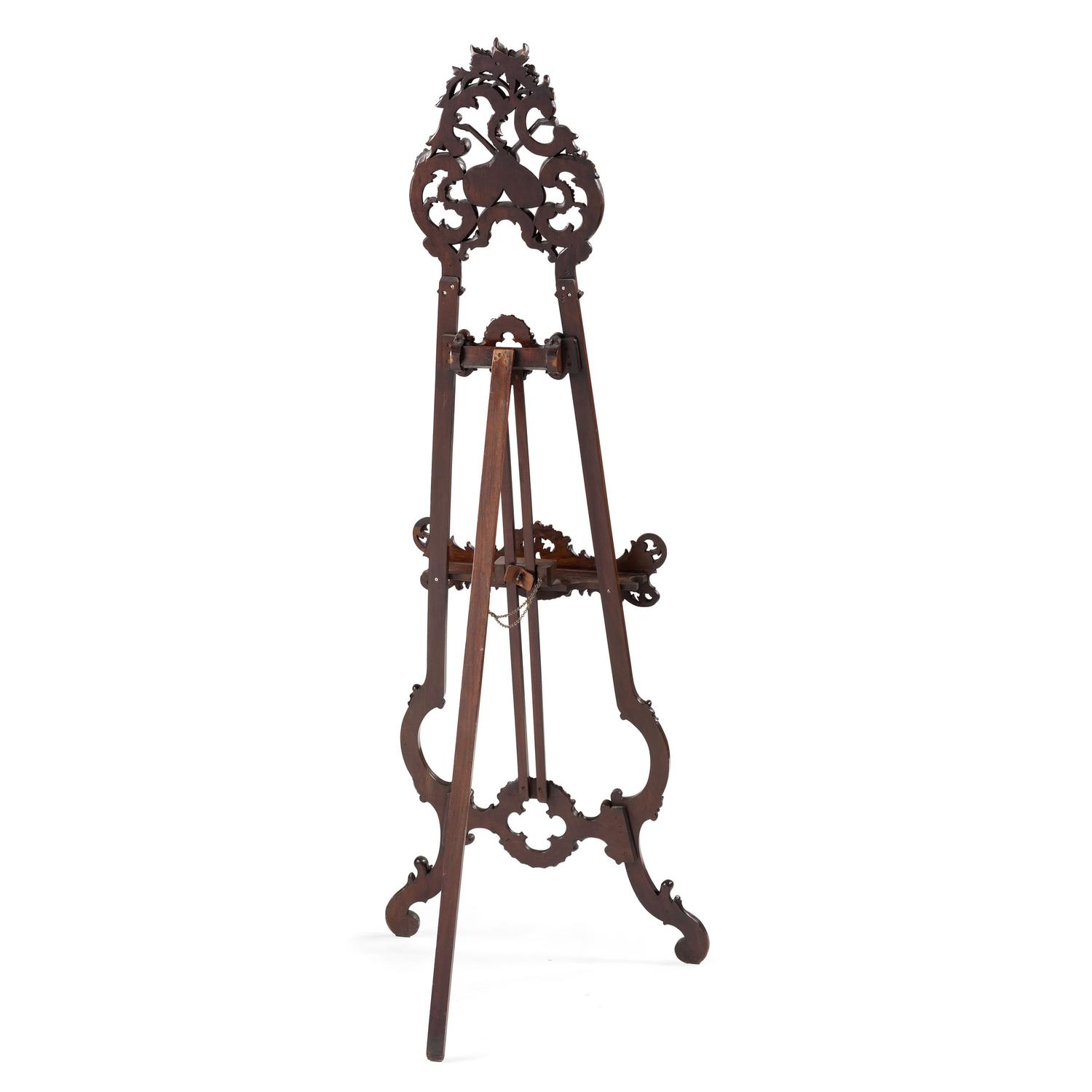 A Renaissance Revival Carved Walnut Musical Easel