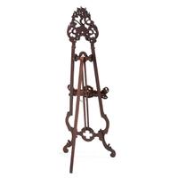 A Renaissance Revival Carved Walnut Musical Easel