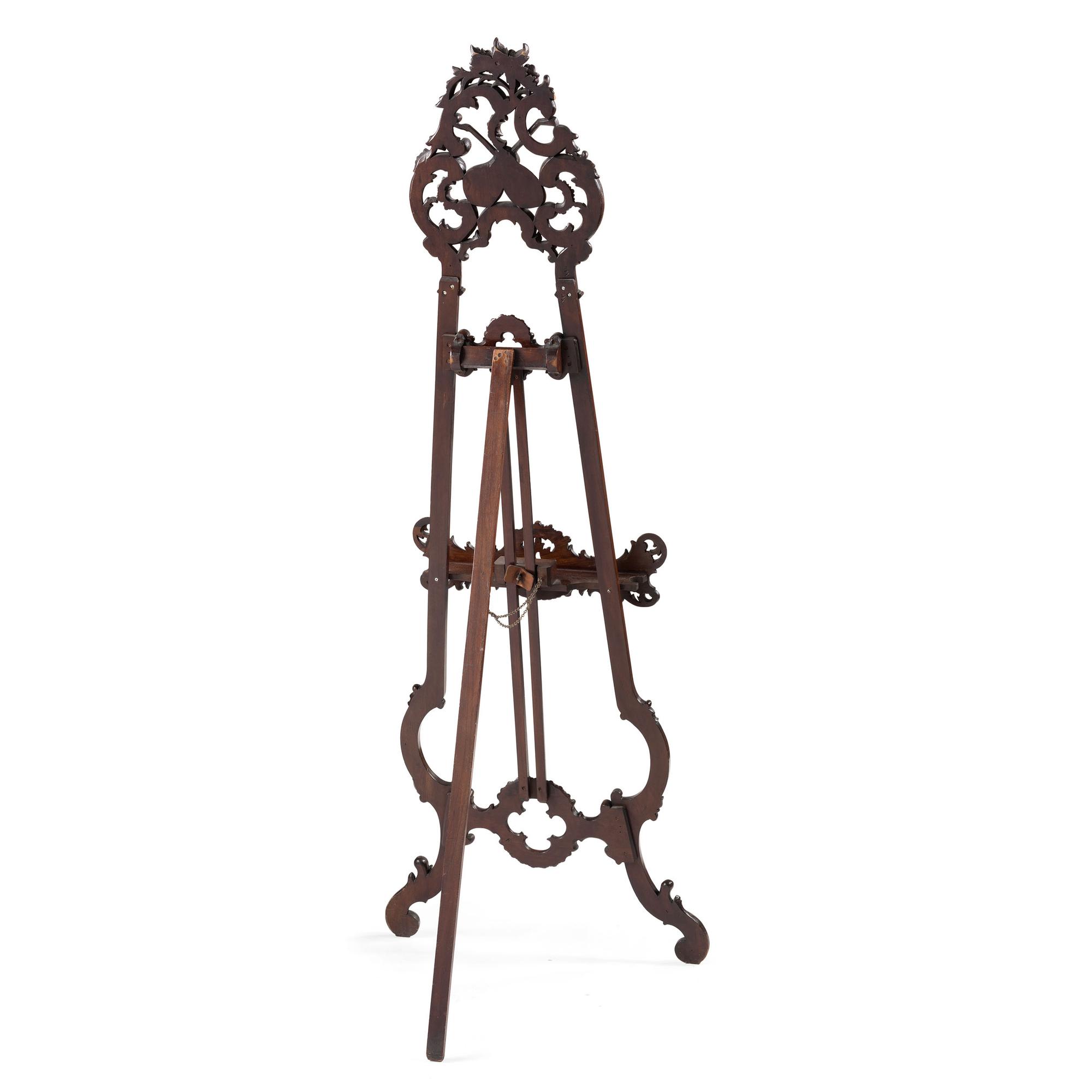 A Renaissance Revival Carved Walnut Musical Easel