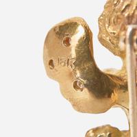 A Collection of Two Yellow Gold and Gemstone Pins