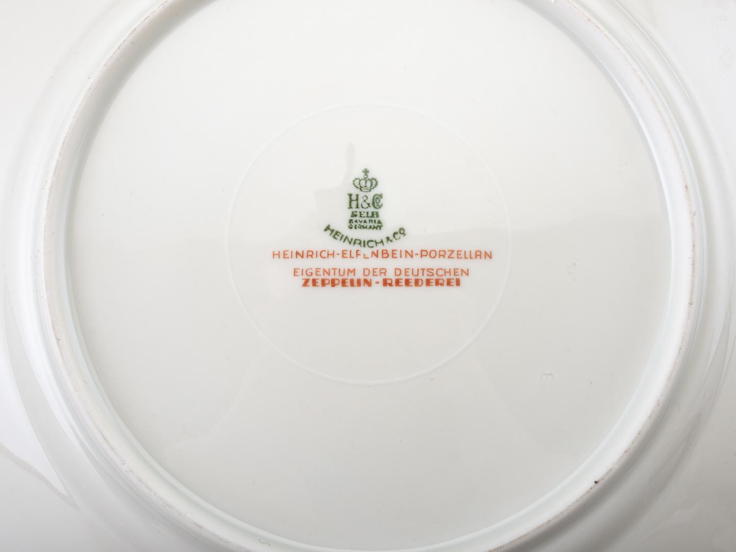 [TRANSPORTATION] - [ZEPPELIN]. Set of Deutsche Zeppelin-Reederei porcelain with dinner plates, salad plates, and sherbet glasses.