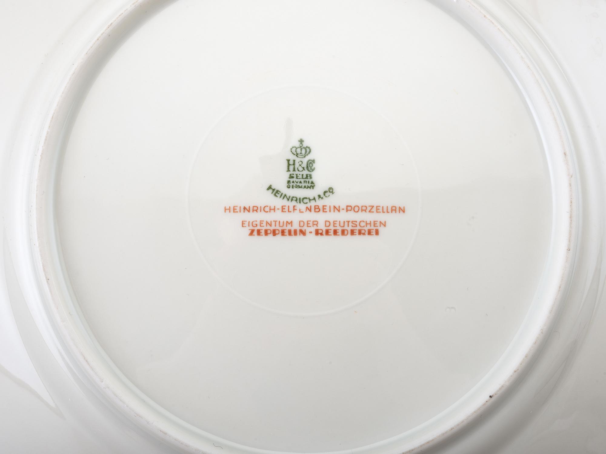 [TRANSPORTATION] - [ZEPPELIN]. Set of Deutsche Zeppelin-Reederei porcelain with dinner plates, salad plates, and sherbet glasses.