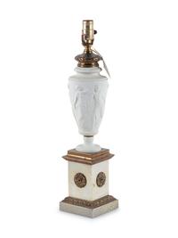A Neoclassical Bisque Porcelain and Gilt Metal Mounted Table Lamp