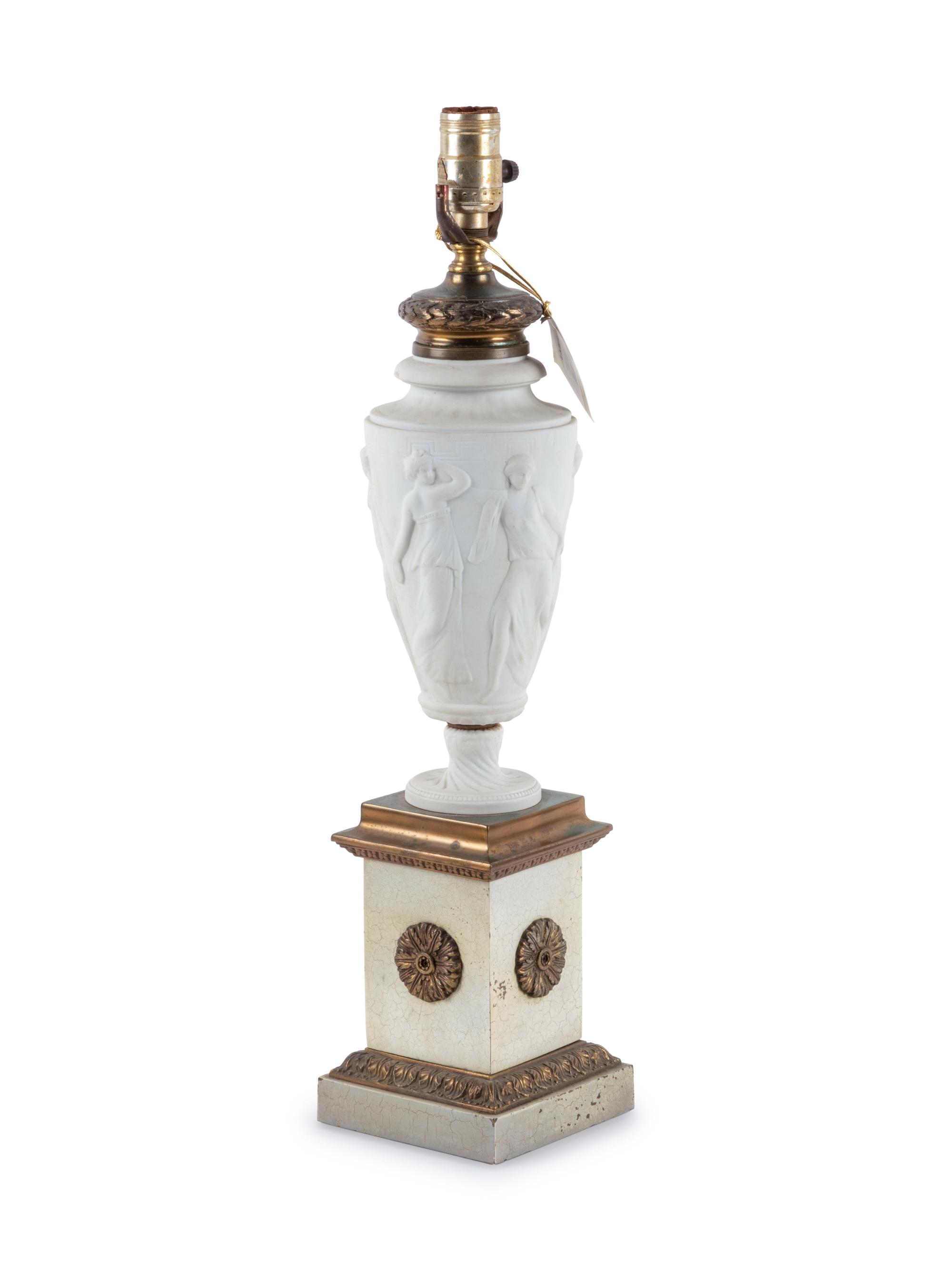 A Neoclassical Bisque Porcelain and Gilt Metal Mounted Table Lamp