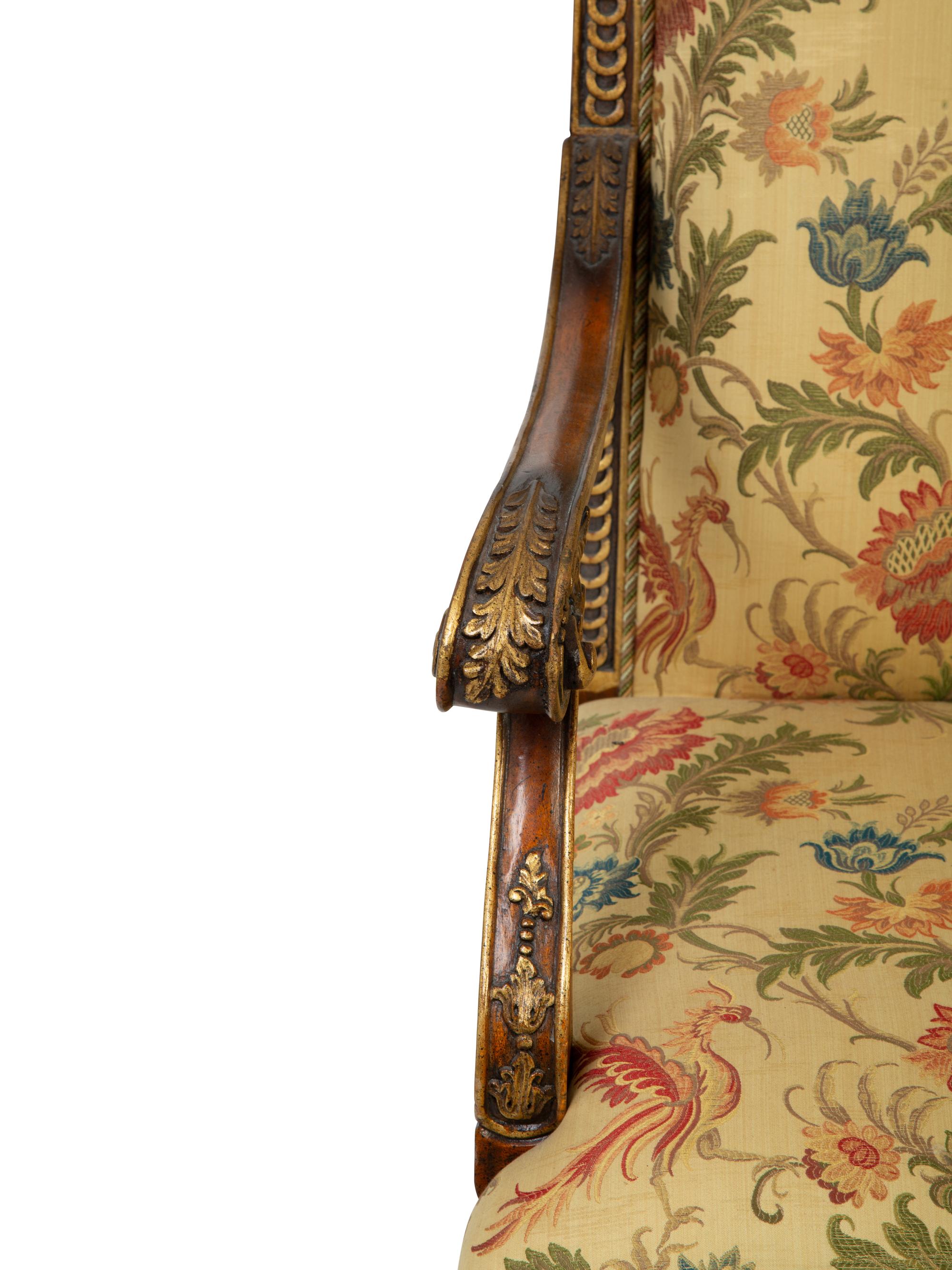 A Portuguese Carved Oak and Parcel Gilt Settee — 20TH CENTURY