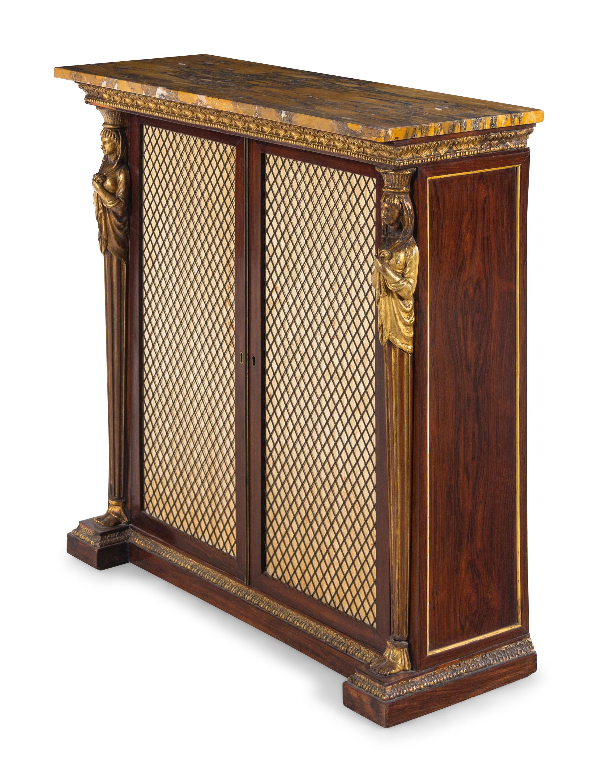 A Regency Egyptian Revival Style Parcel Gilt Rosewood Cabinet