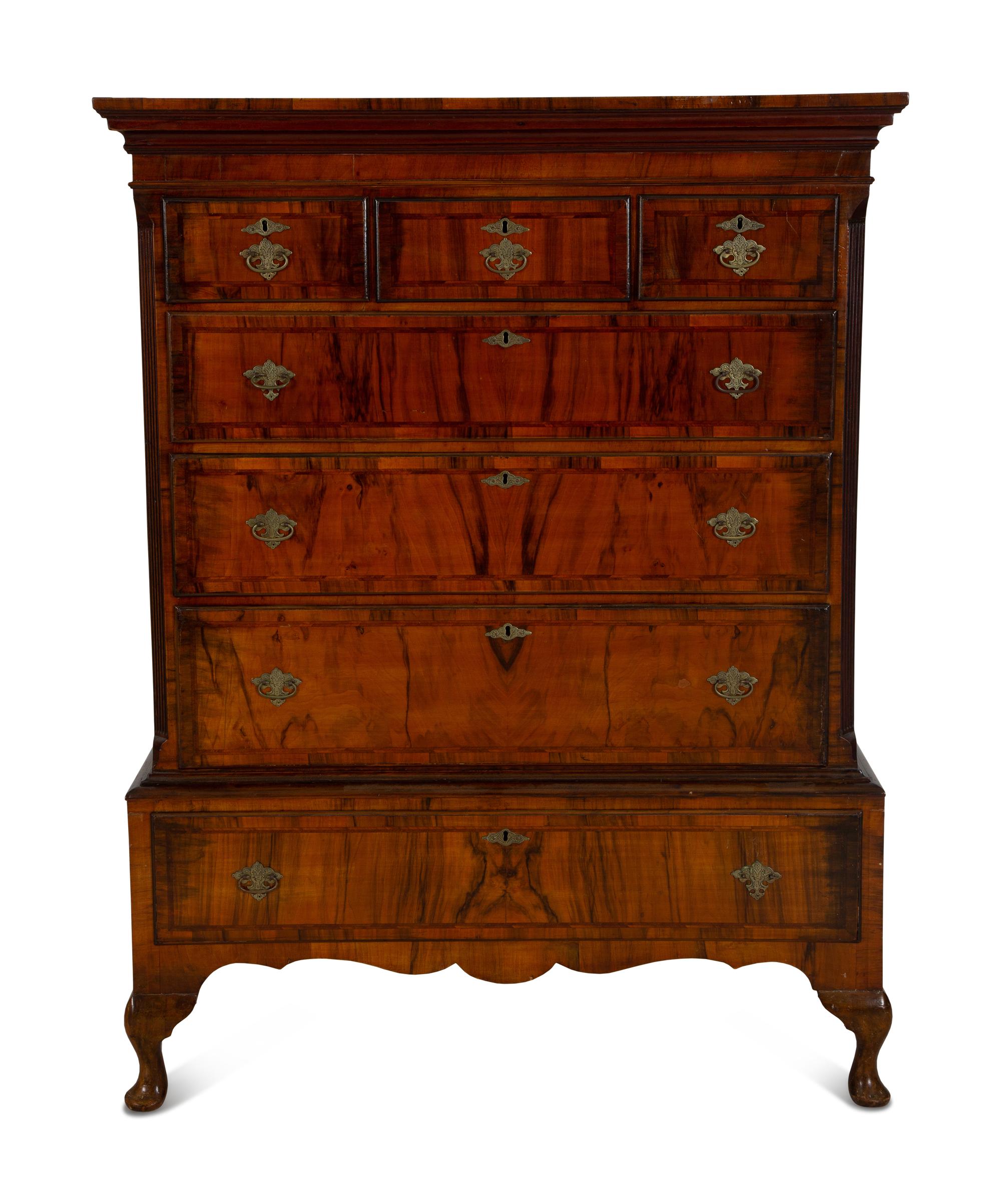 A Queen Anne Figured Mahogany Chest on Stand