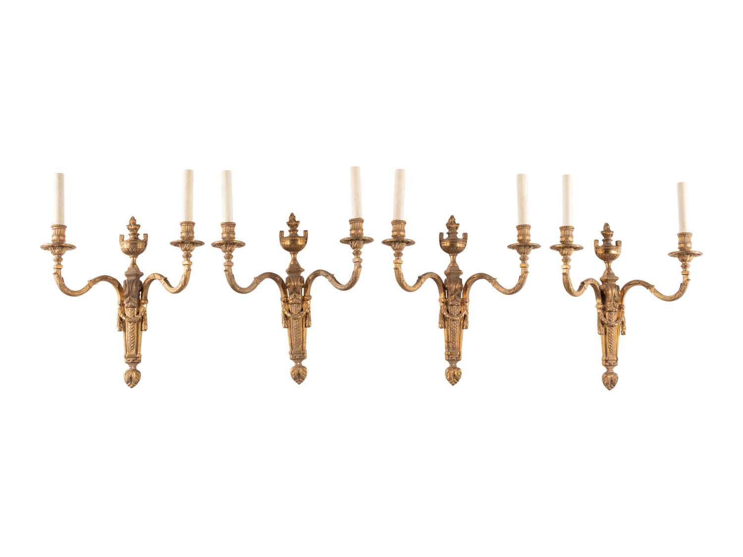 A Set of Four Louis XVI Style Gilt Bronze Two-Light Sconces