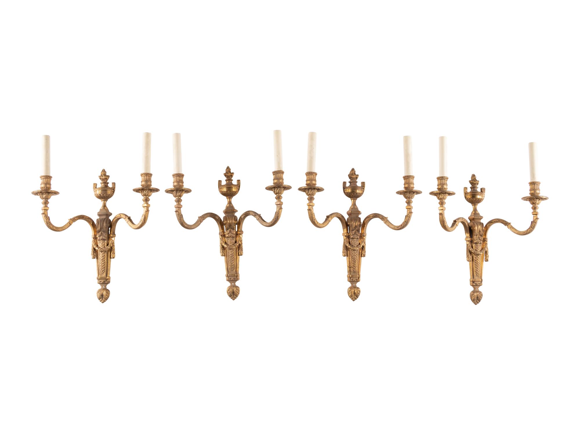 A Set of Four Louis XVI Style Gilt Bronze Two-Light Sconces