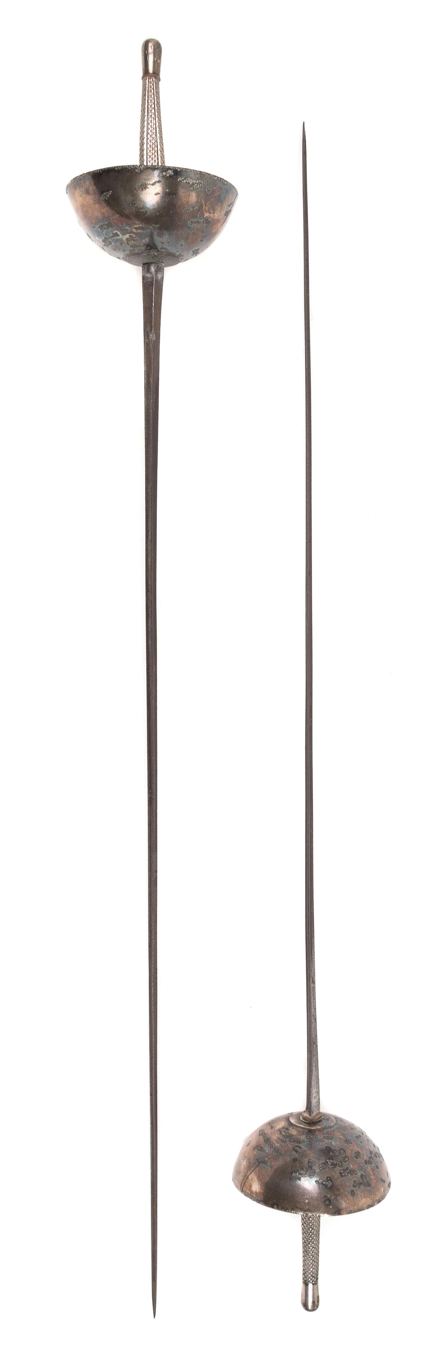 A Pair of Continental Fencing Epees Length 41 1/4 inches.