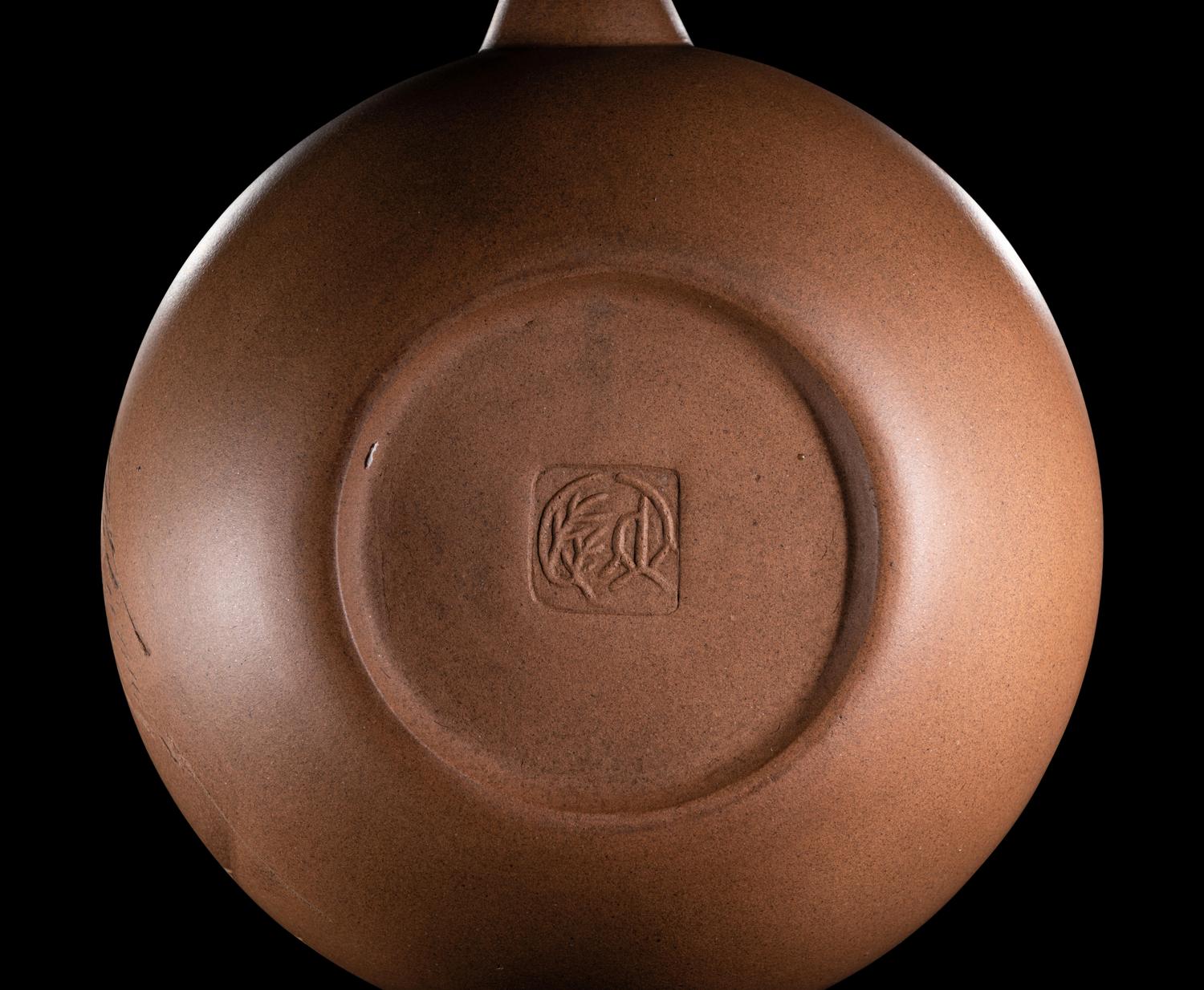 A Chinese Yixing Zisha Pottery Teapot