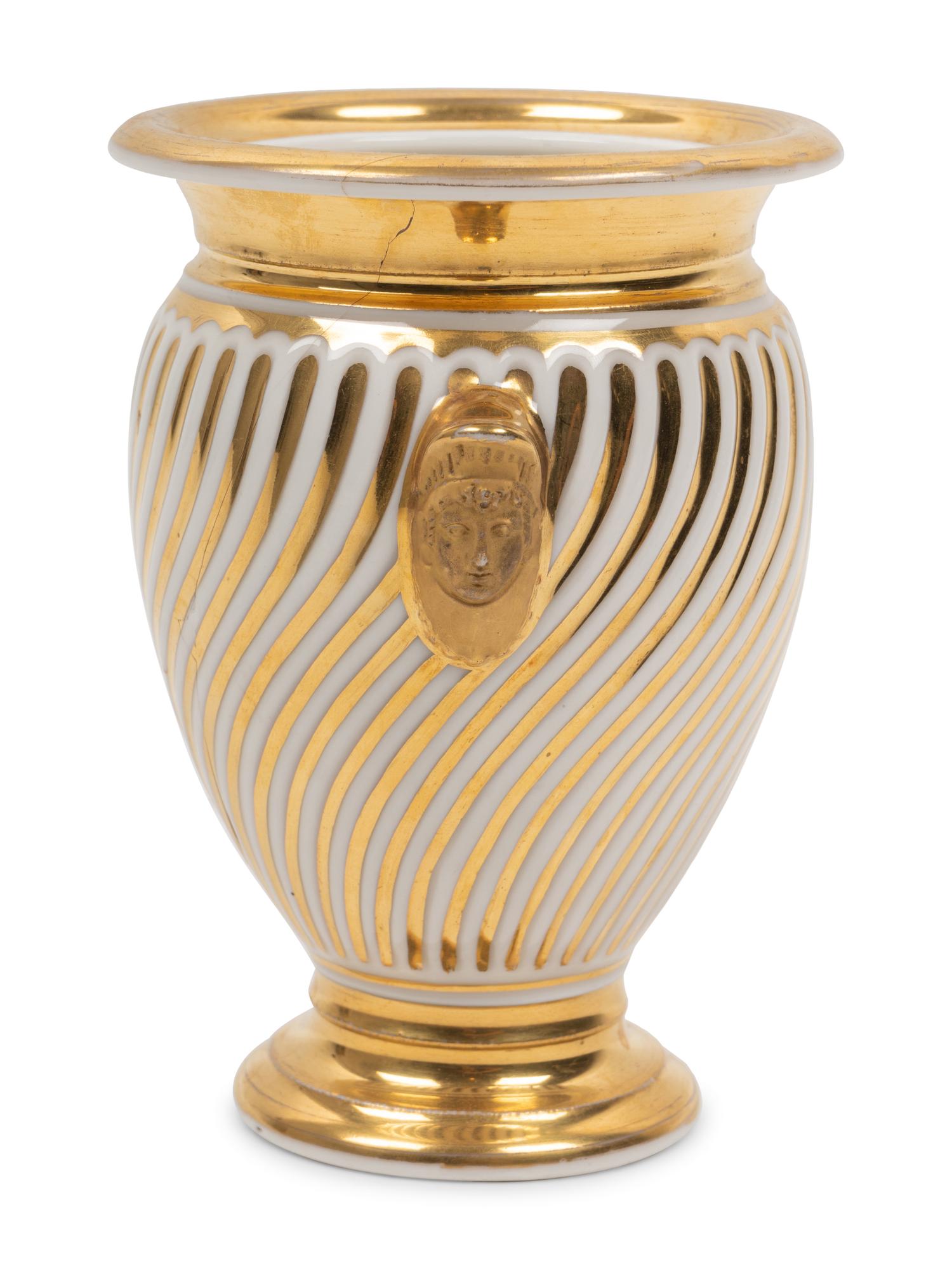 A Continental Parcel Gilt Porcelain Spiral Molded Vase
