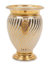 A Continental Parcel Gilt Porcelain Spiral Molded Vase