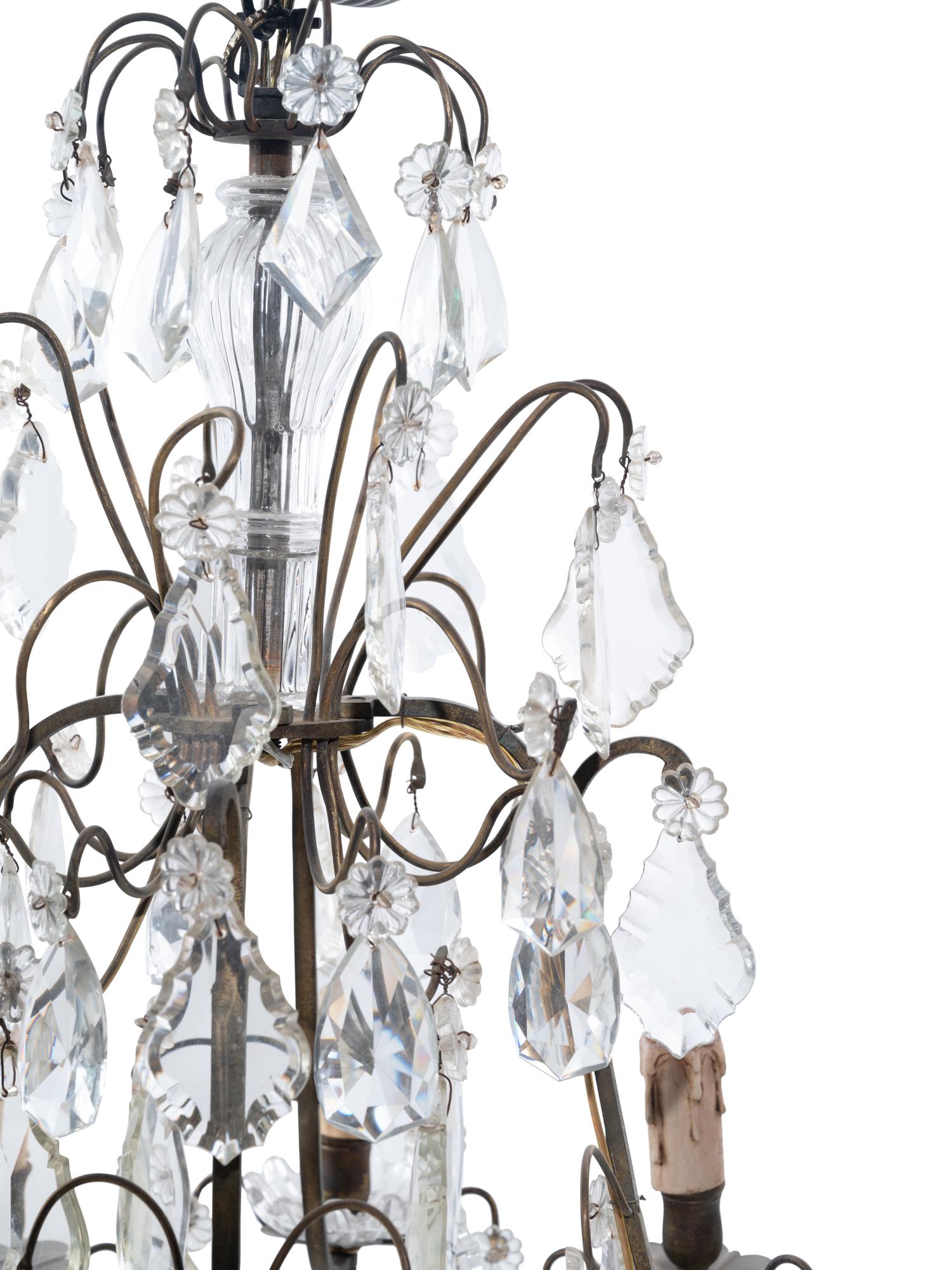 A Continental Gilt Metal and Cut Glass Eight-Light Chandelier