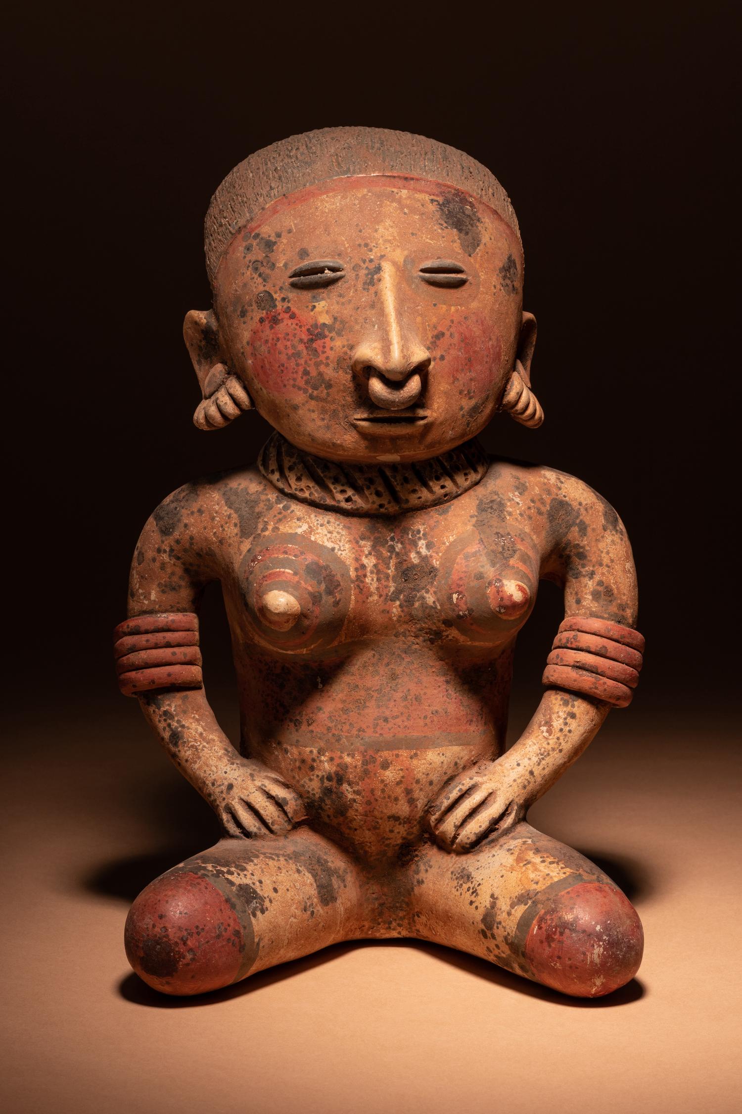 A Nayarit Terracotta Seated Female Figure