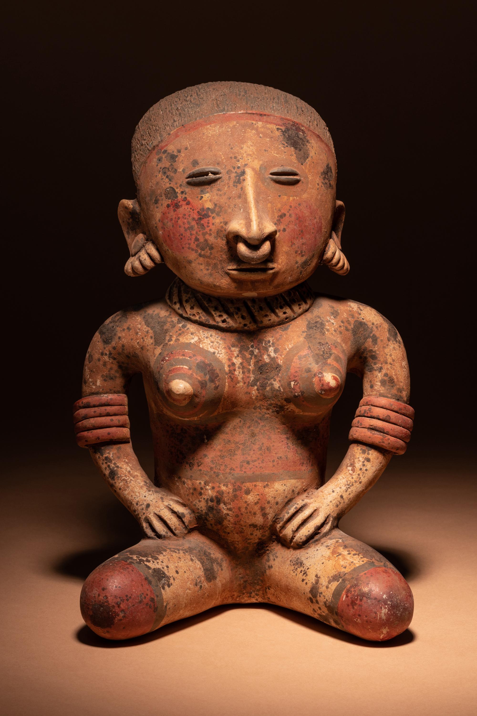 A Nayarit Terracotta Seated Female Figure