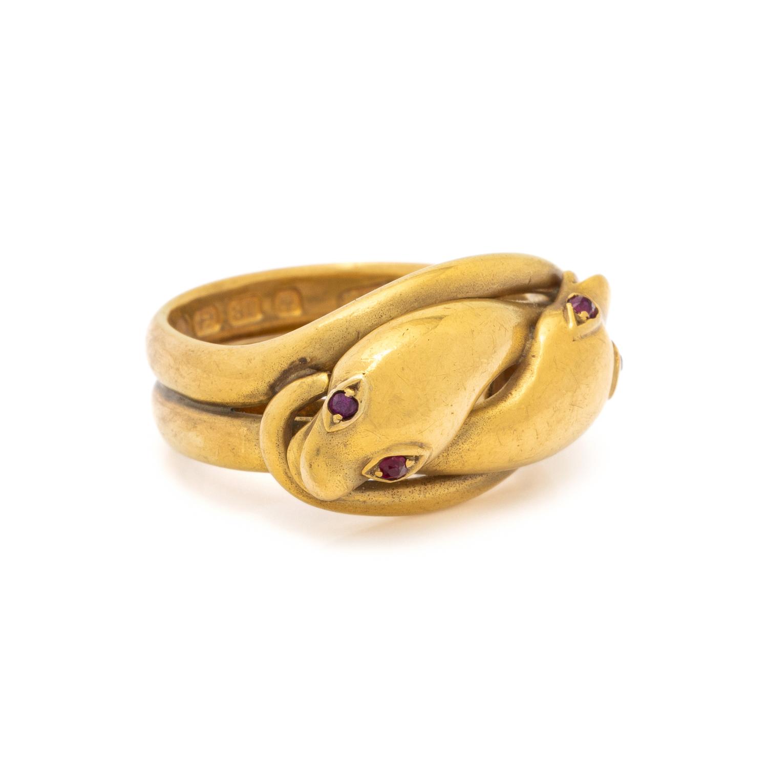 BRITISH, YELLOW GOLD AND RUBY SNAKE RING