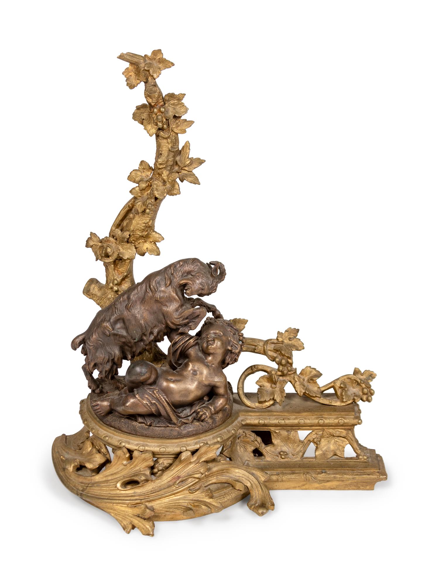 A Pair of Louis XV Style Bronze Andirons with a Fireguard