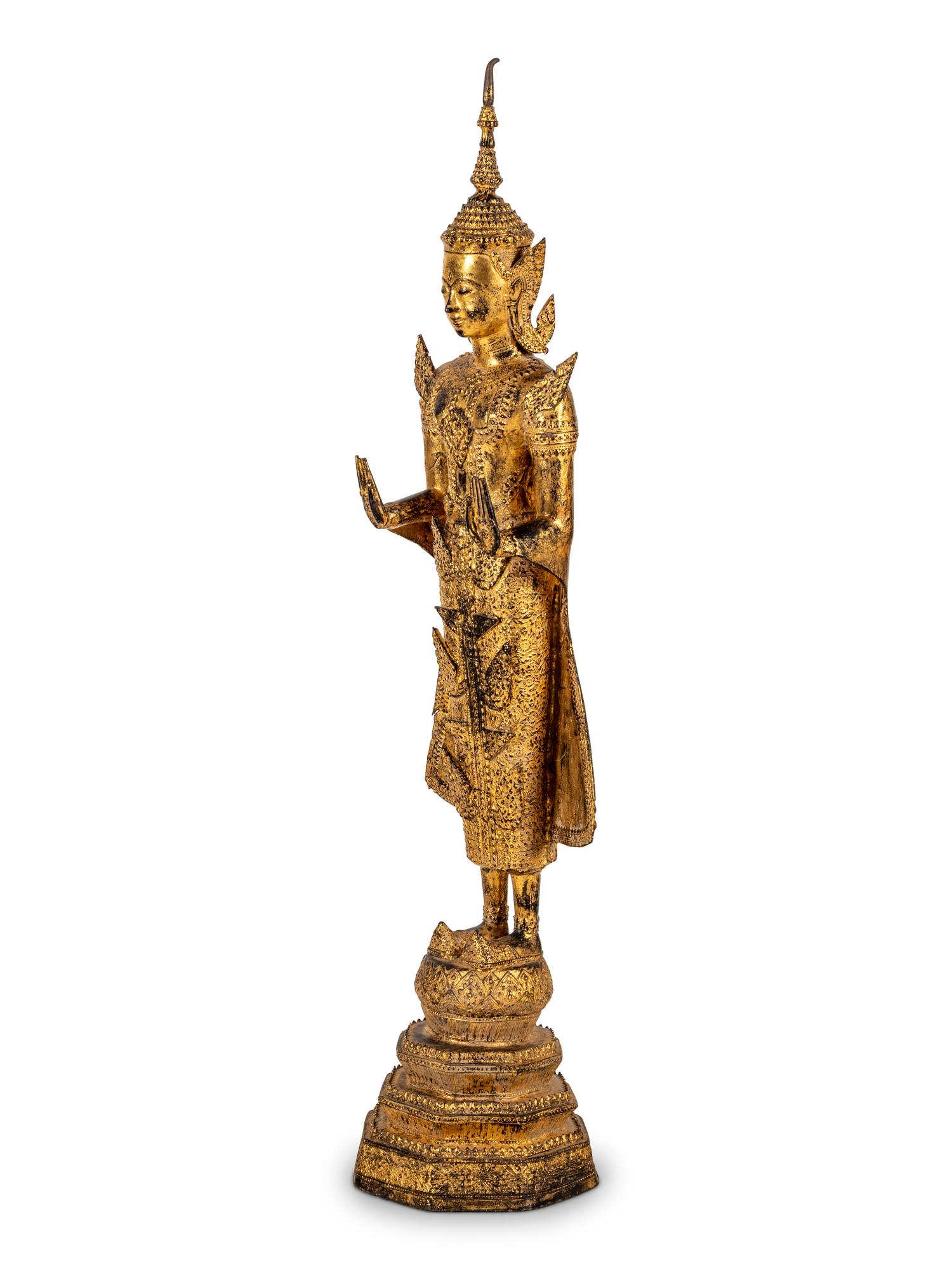A Large Thai Gilt Bronze Figure of a Standing Deity
