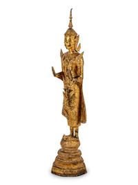 A Large Thai Gilt Bronze Figure of a Standing Deity