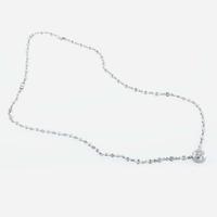 A 14K, white gold diamond bezel set necklace