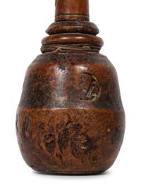 A Continental Carved Wood Pestle