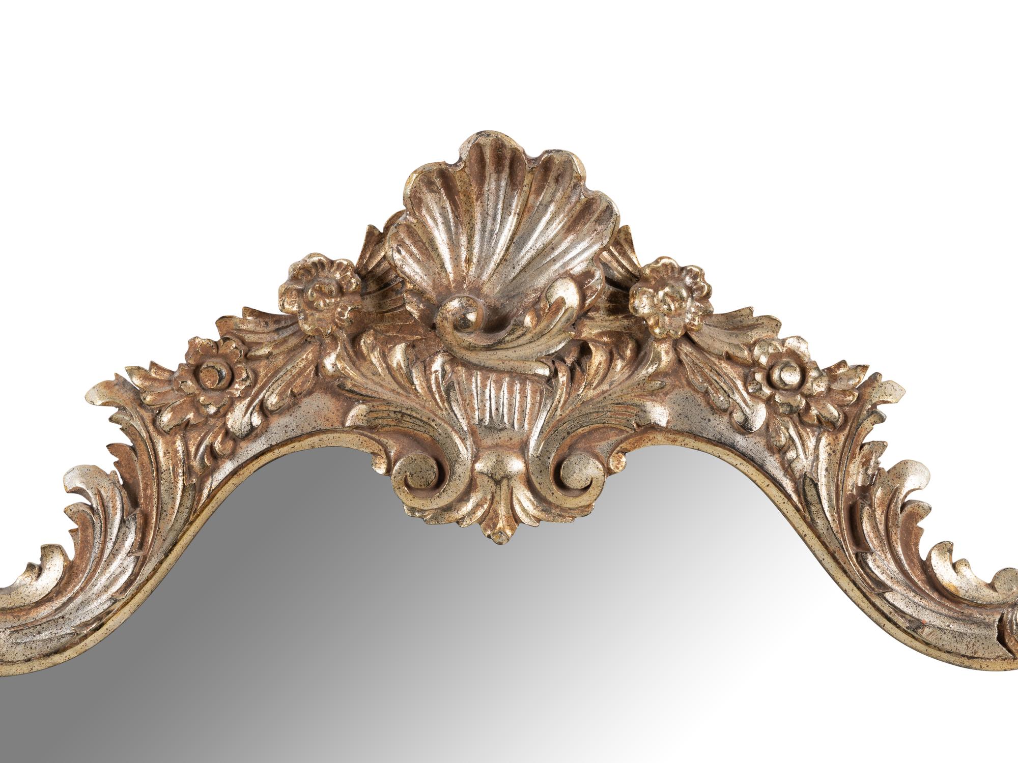 A Baroque Style Silvered Wood Mirror