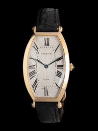 CARTIER, 18K YELLOW GOLD 'TONNEAU XL' WATCH