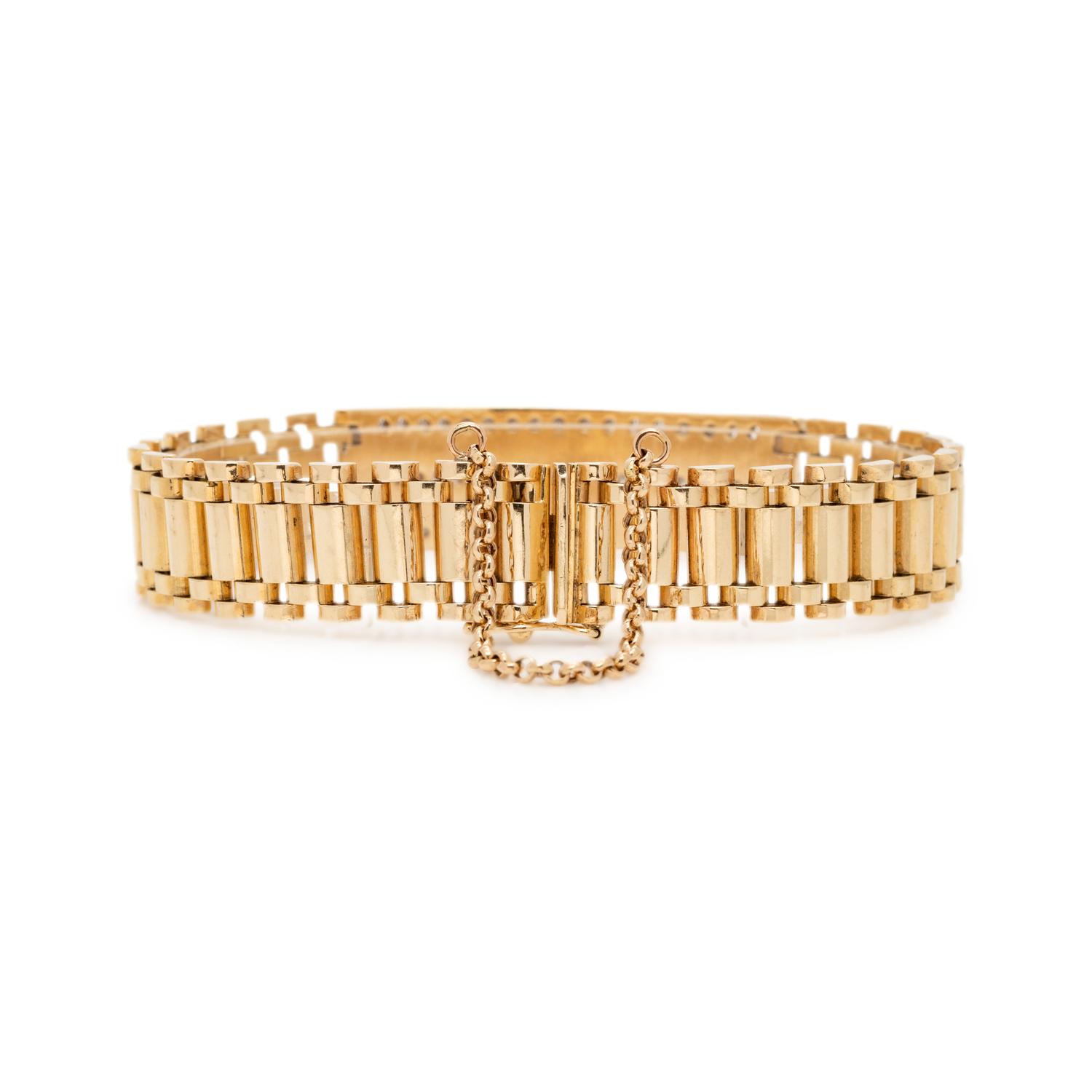 YELLOW GOLD, DIAMOND AND ONYX BRACELET
