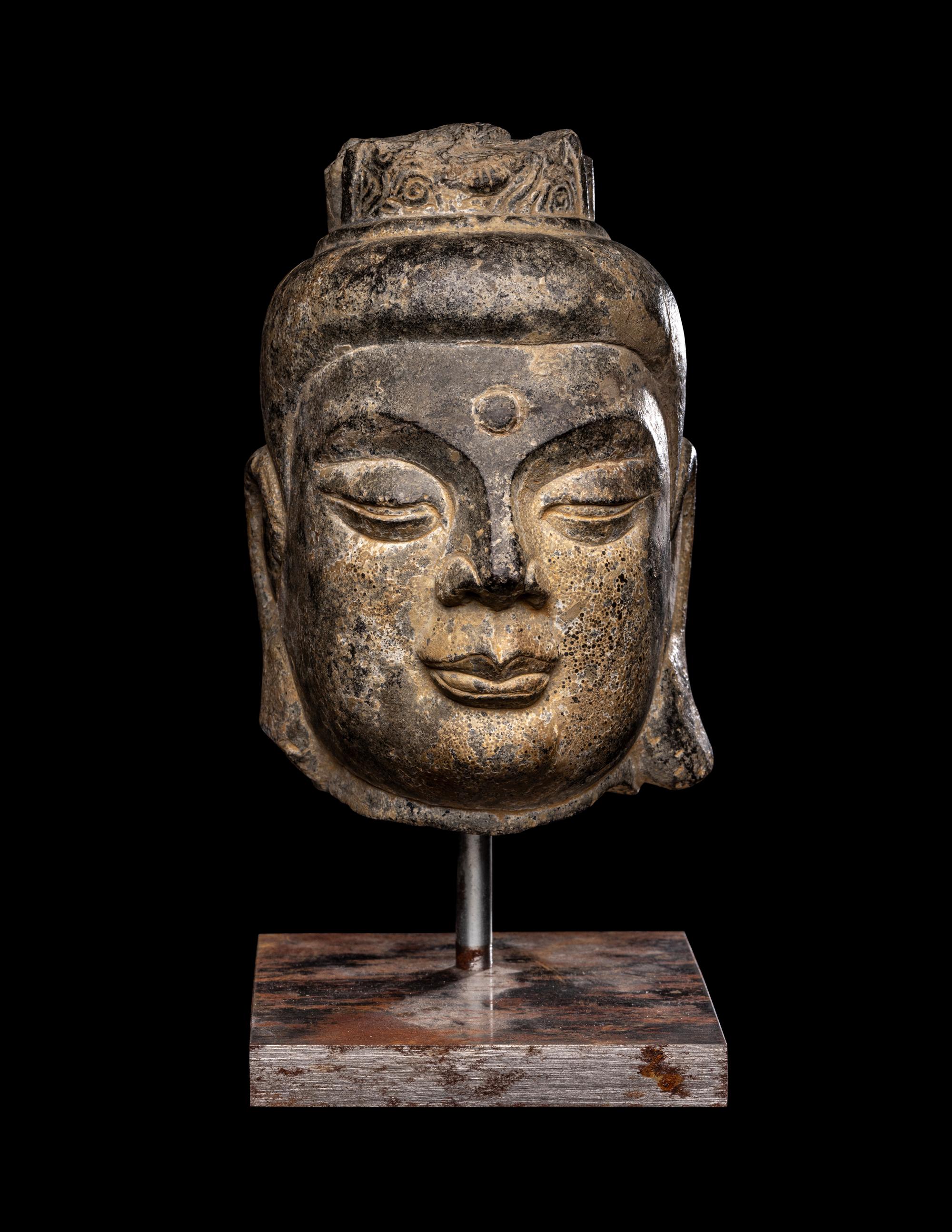 A Chinese Carved Stone Head of Buddha