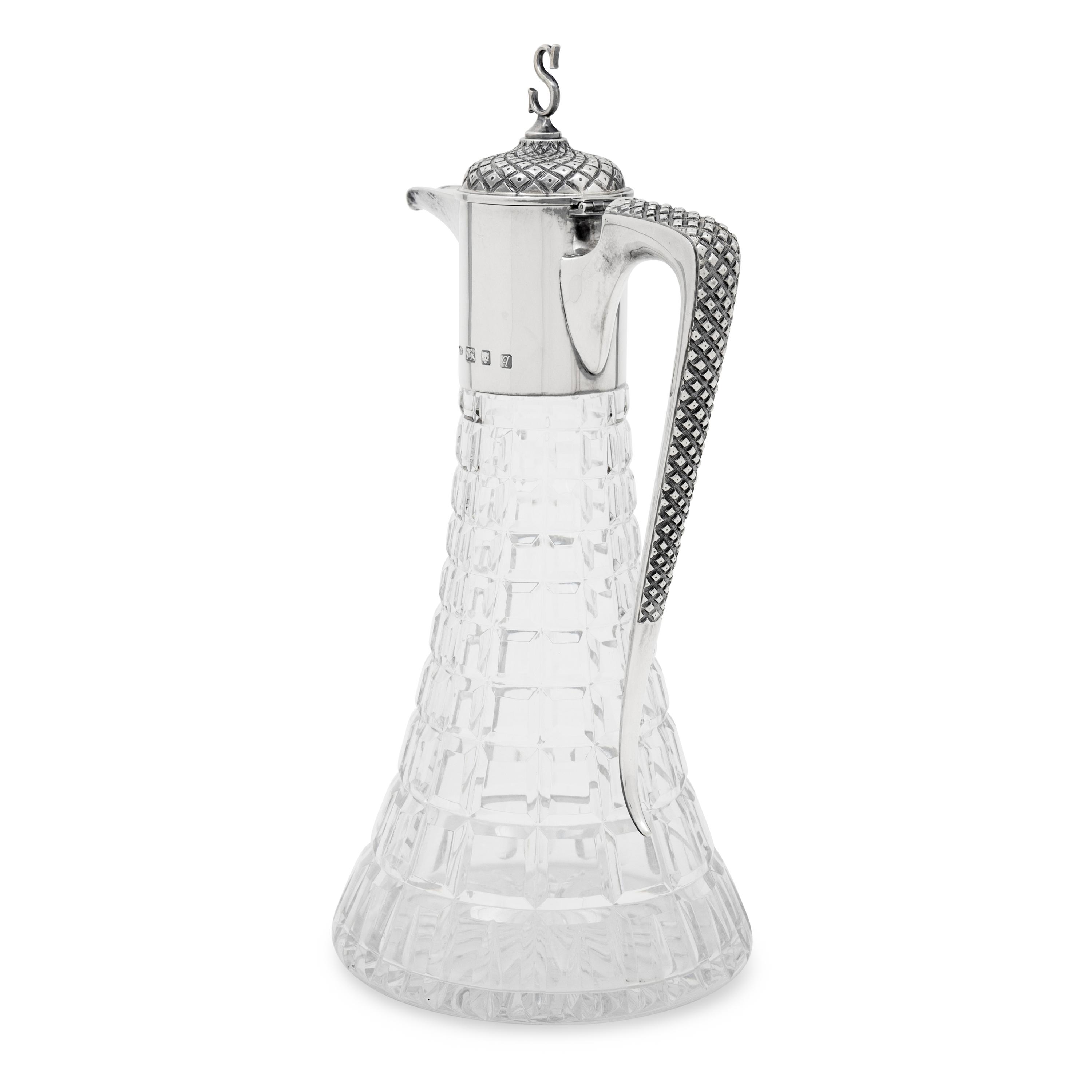 An English Silver Mounted Cut Glass Claret Jug