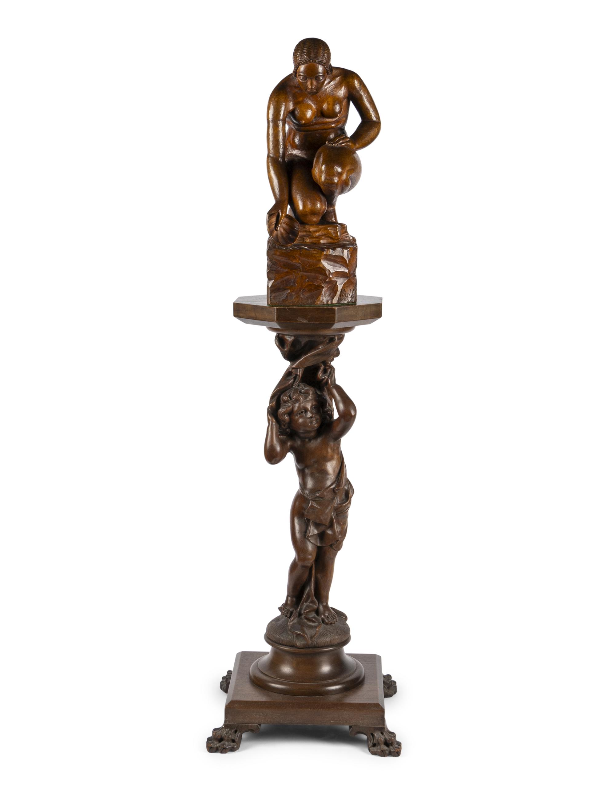 A Carved Wood Sculpture and a Venetian Style Carved Walnut Pedestal