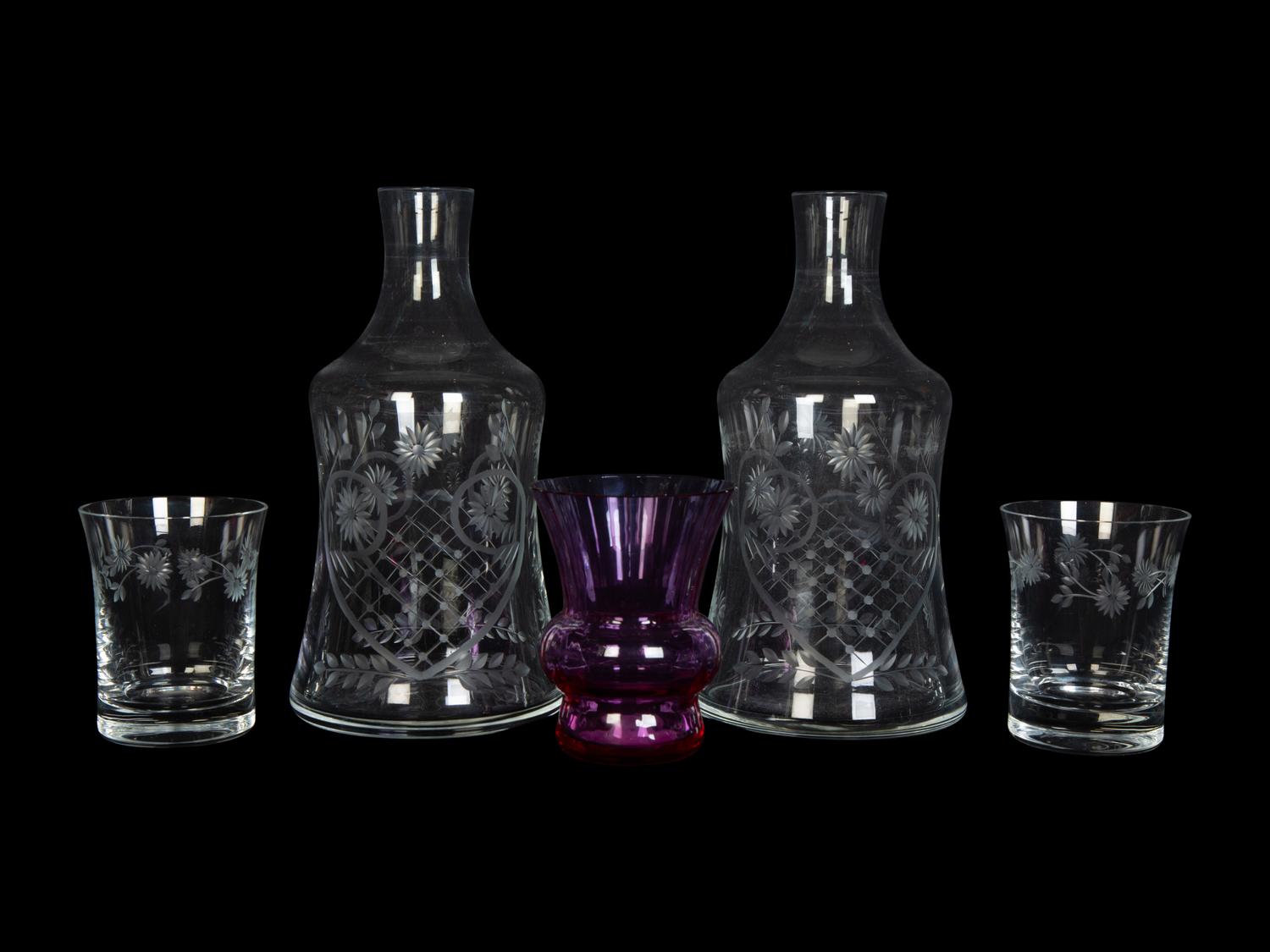 A Pair of Etched Glass Bedside Carafes and a Baccarat Bud Vase