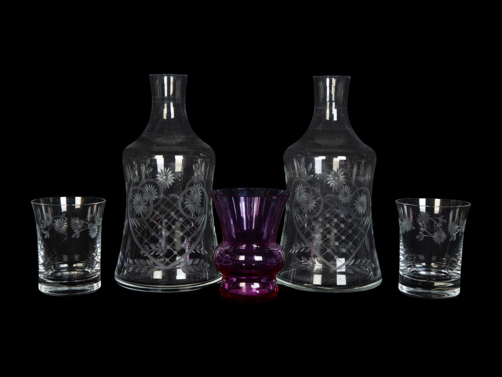 A Pair of Etched Glass Bedside Carafes and a Baccarat Bud Vase