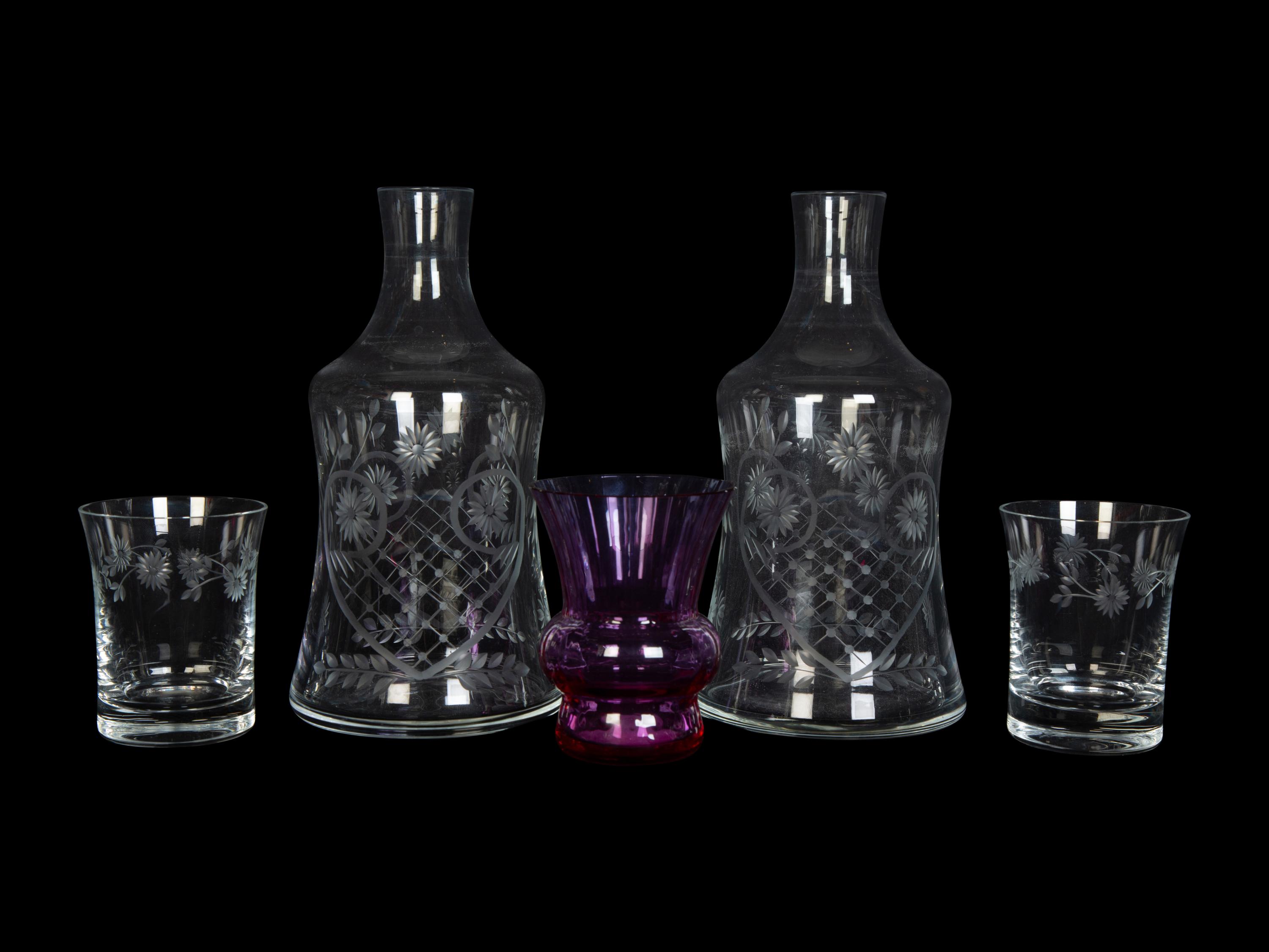 A Pair of Etched Glass Bedside Carafes and a Baccarat Bud Vase