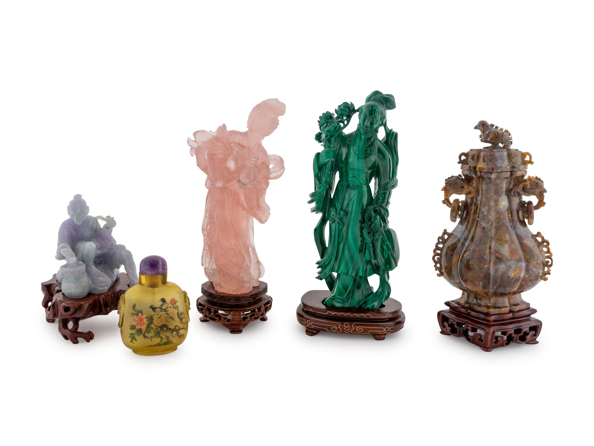 Four Chinese Hardstone Figures and a Glass Snuff Bottle