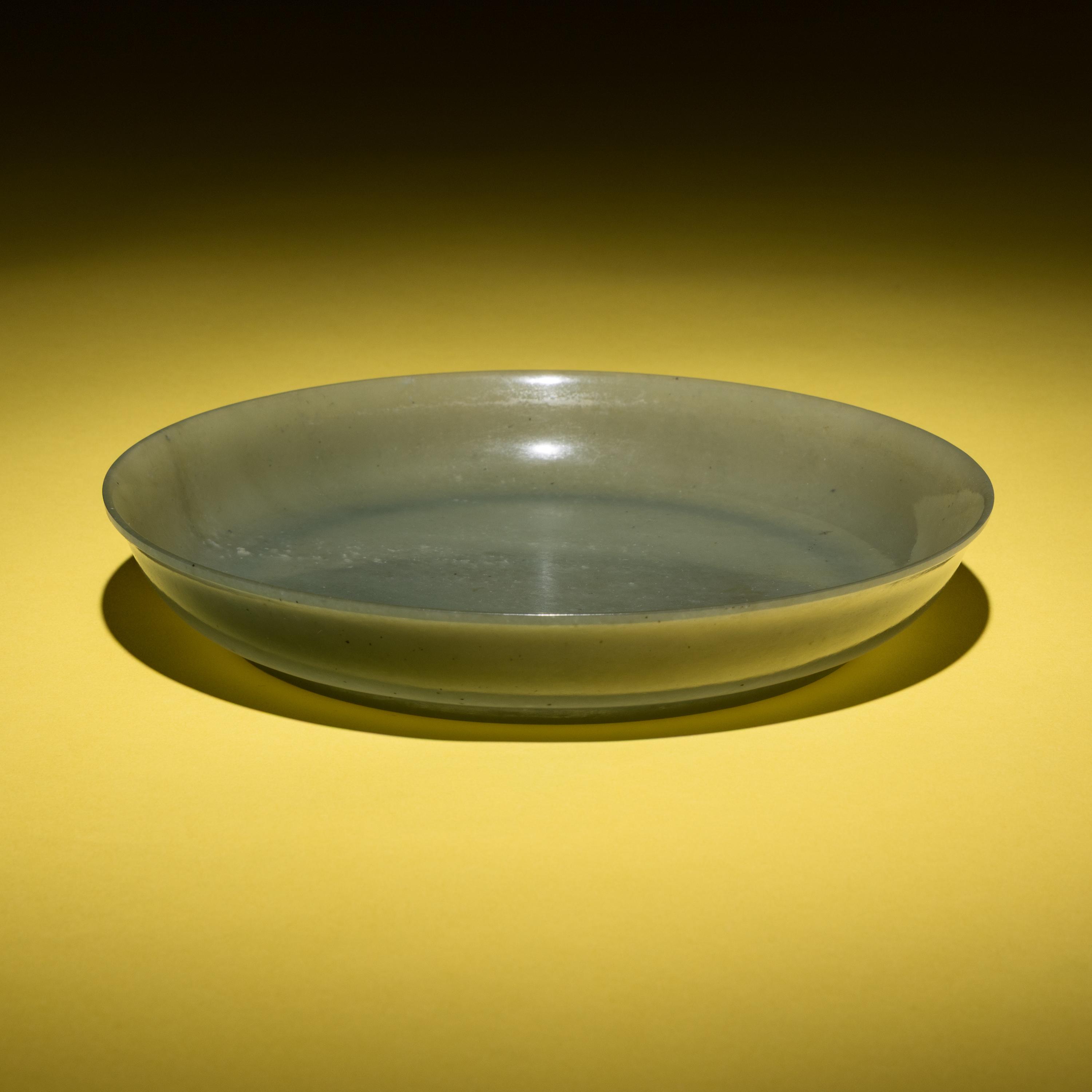 A Chinese Celadon Jade Dish, 19th Century — 清晚期 青玉盤