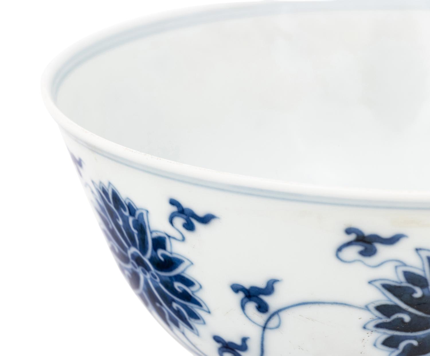 Four Chinese Blue and White Porcelain 'Lotus' Bowls